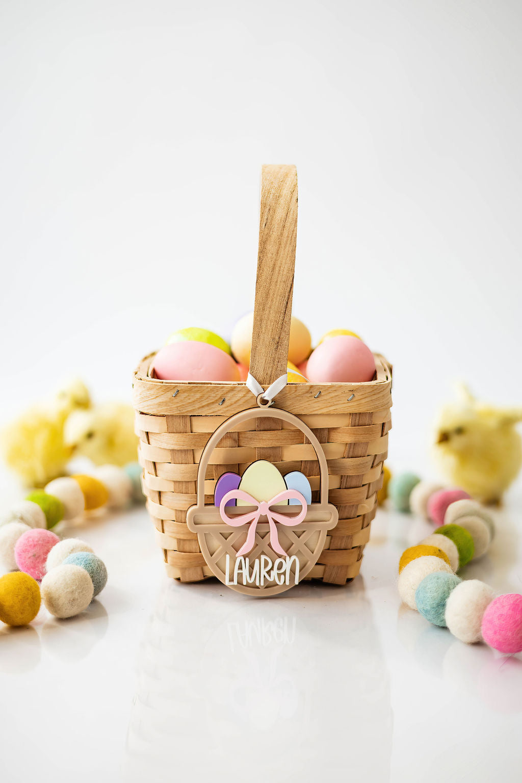 Woven Easter Basket with Bow and Eggs