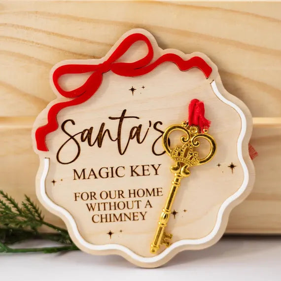 Santa's magic key sign with a bow accent and a gold key